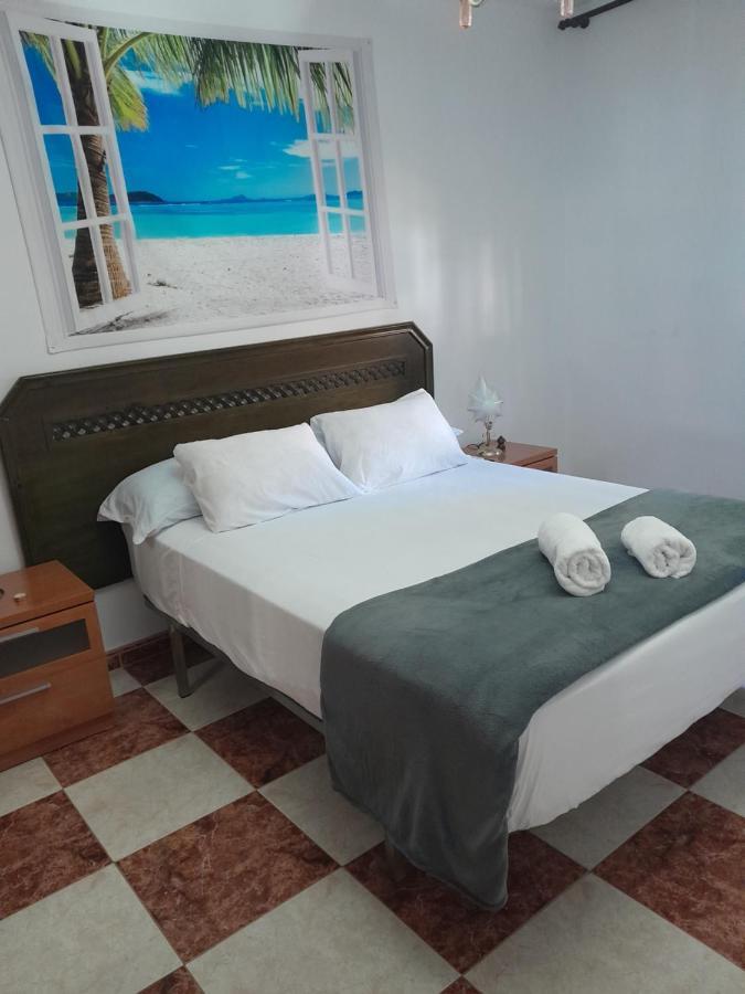 Disfruta De Un Barrio Tranquilo Apartment อัลกาลา เด กัวไดรา ภายนอก รูปภาพ